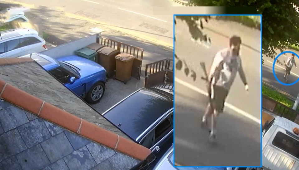 CCTV footage of a man walking down a street, appearing to carry a gun.