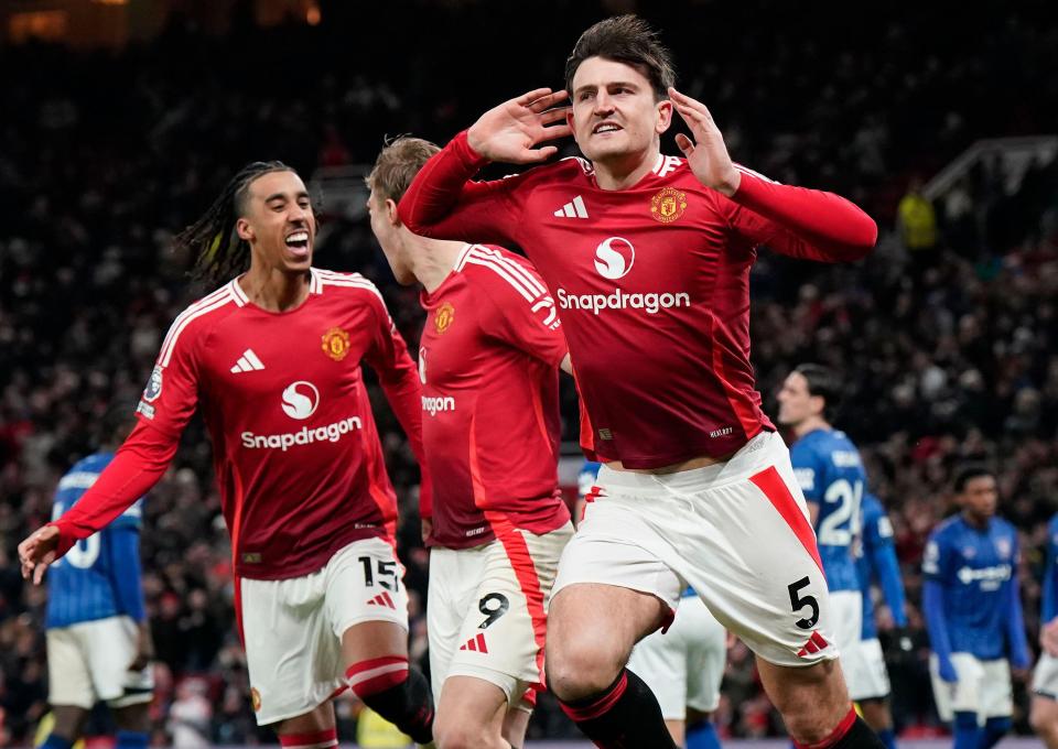 Harry Maguire of Manchester United celebrates scoring a goal.