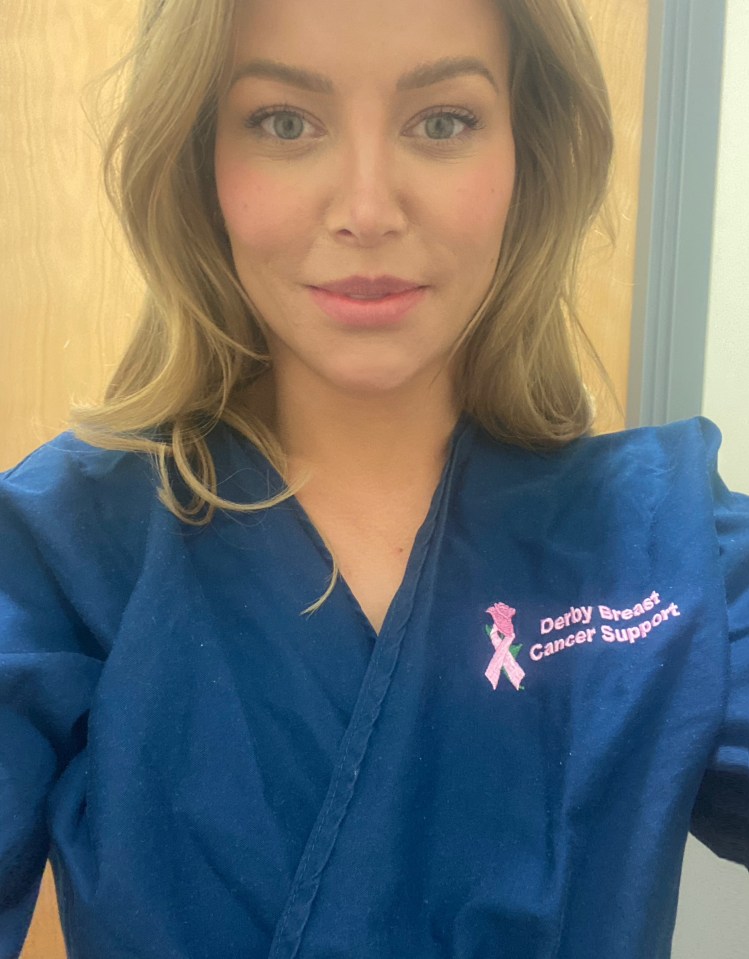 Woman in a blue Derby Breast Cancer Support shirt.