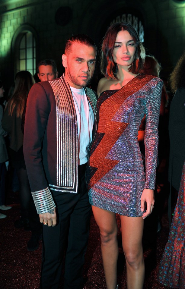 Dani Alves and Joana Sanz at the Etam fashion show during Paris Fashion Week.