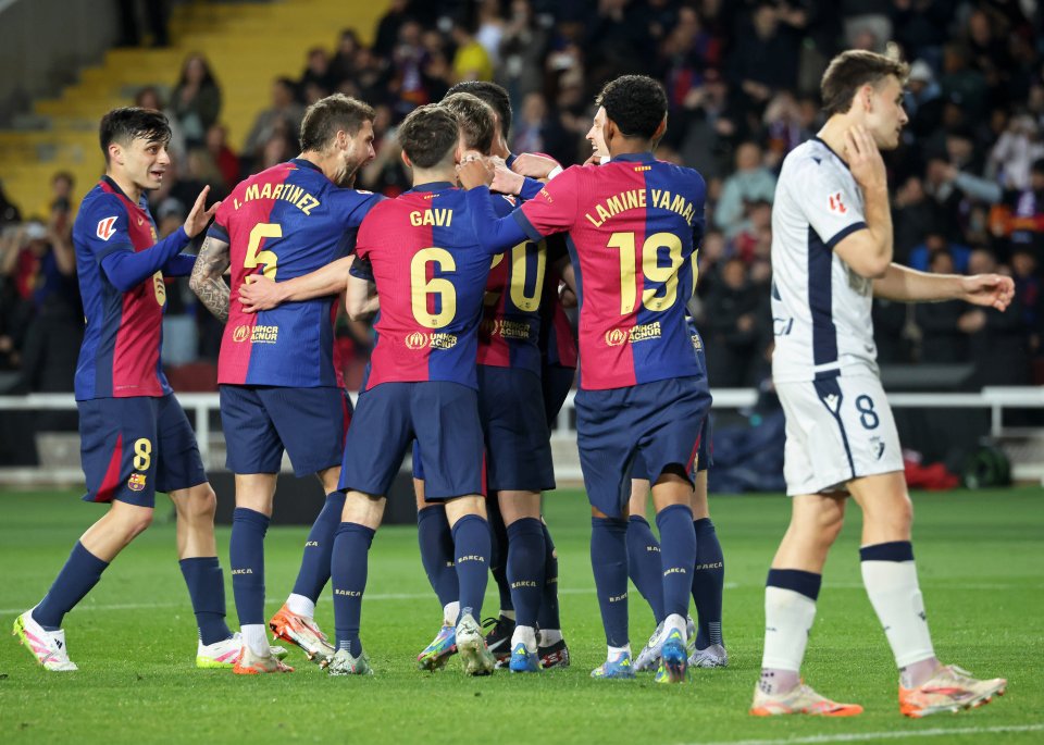 FC Barcelona players celebrating a goal.