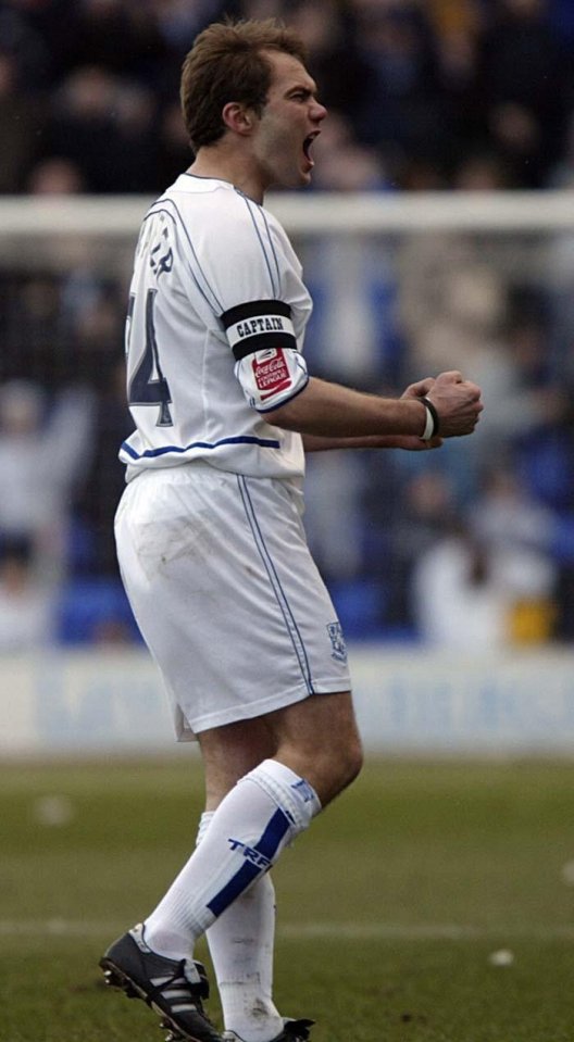 Soccer player celebrating a goal.