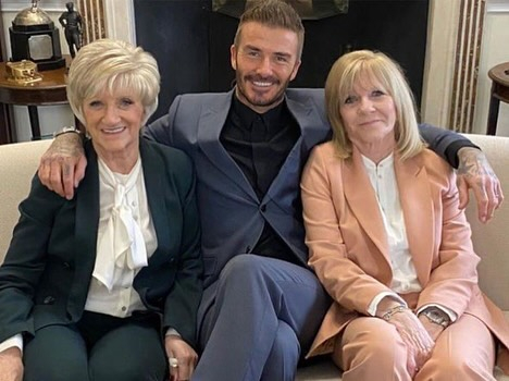 David Beckham with his mothers.