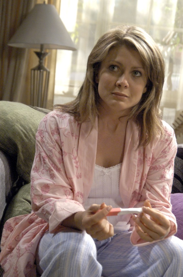 Natalie Bassingthwaighte looking at a pregnancy test.