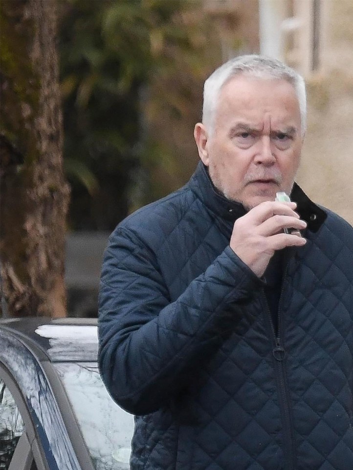 Huw Edwards pictured outdoors.