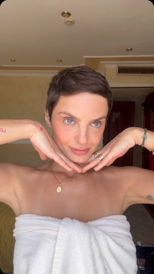 Domenica Calarco in a white towel.