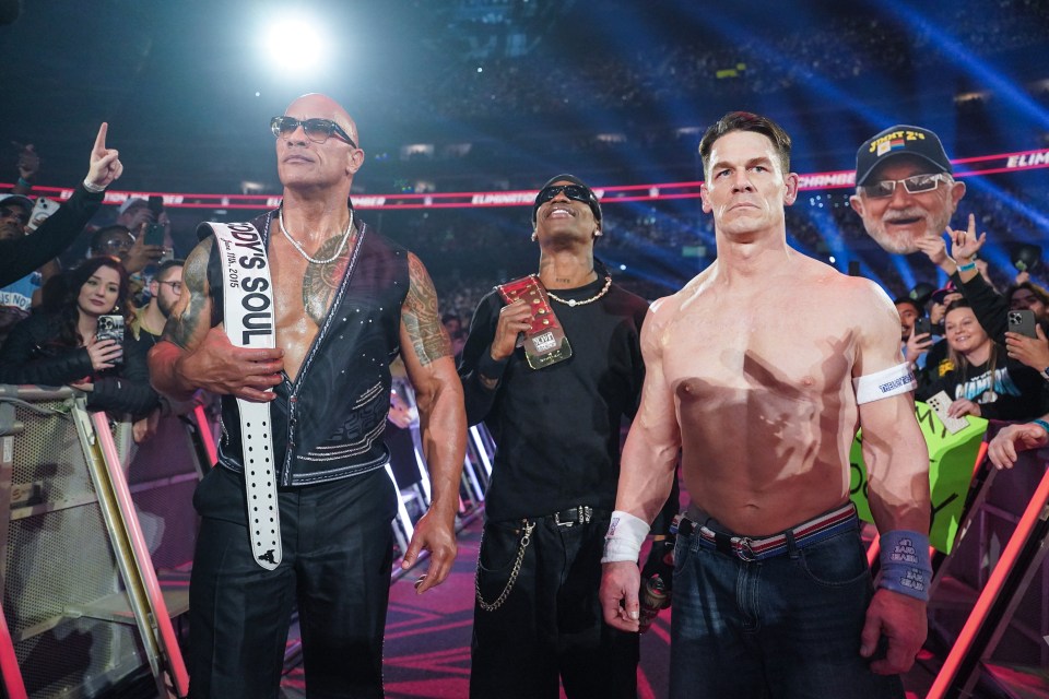 Dwayne "The Rock" Johnson, Travis Scott, and John Cena at WWE Elimination Chamber.