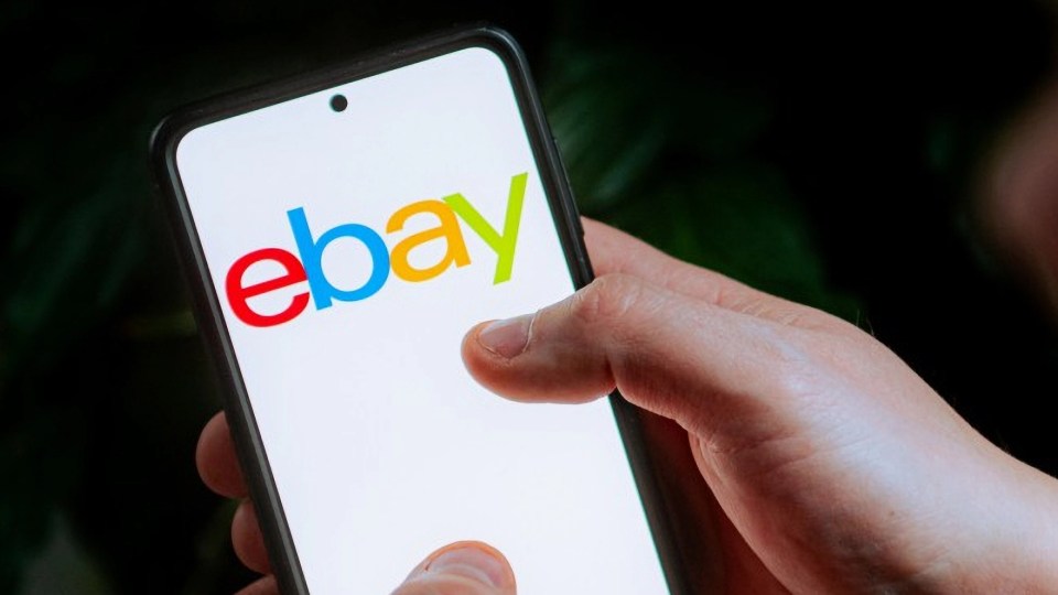 Smartphone displaying the eBay logo.