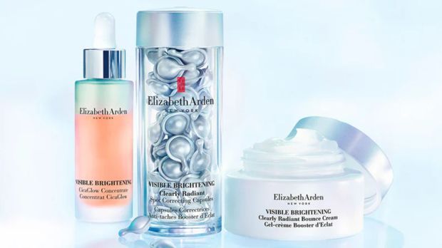 Elizabeth Arden Visible Brightening skincare products: serum, capsules, and cream.