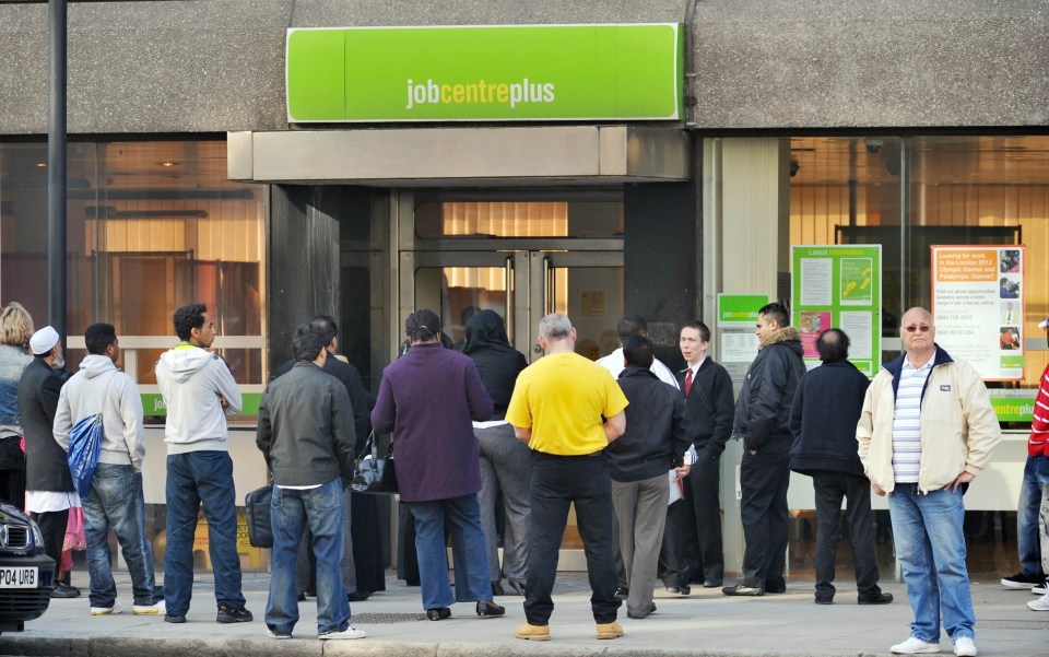 People queueing outside a Job Centre Plus.