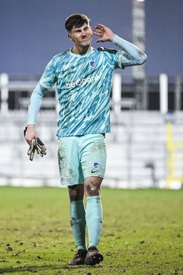 Soccer goalkeeper Mike Penders celebrates a victory.