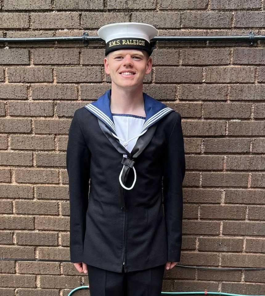Portrait of a smiling Royal Navy sailor in uniform.