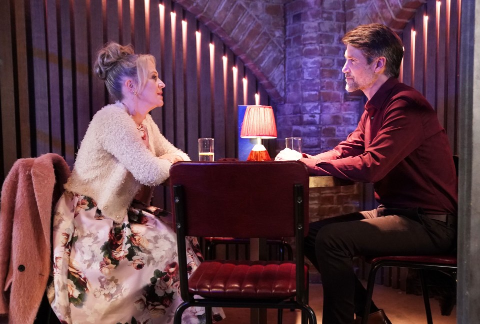 Linda Carter and Jeff having a conversation at a table in a restaurant.