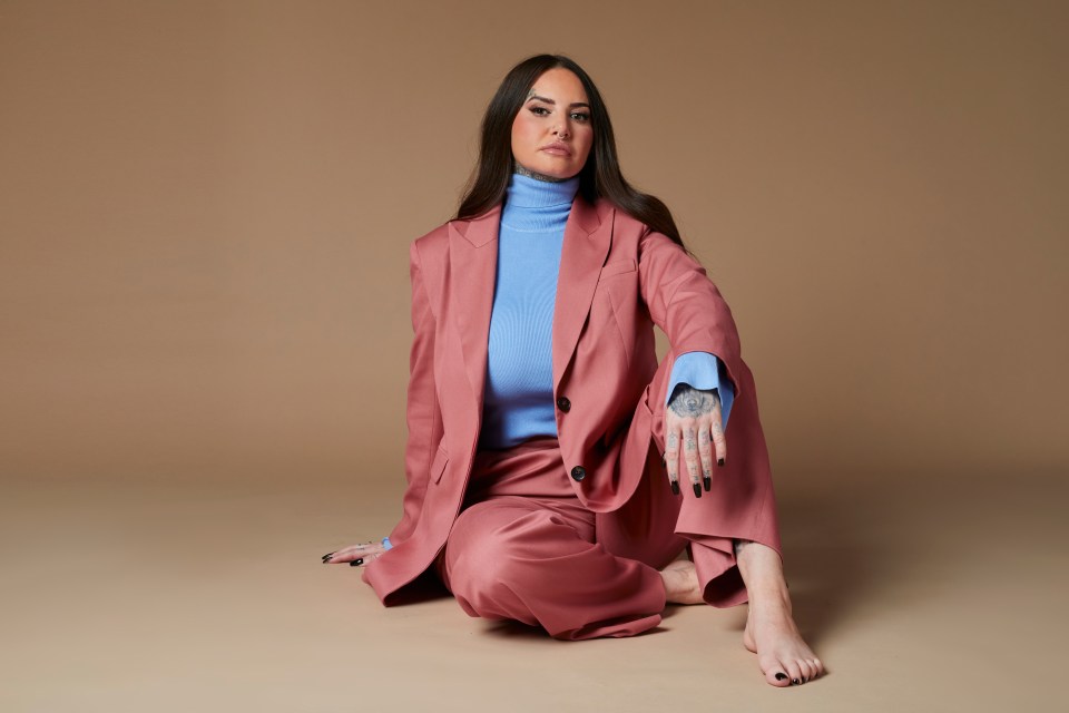 Jemma Lucy in a pink suit.
