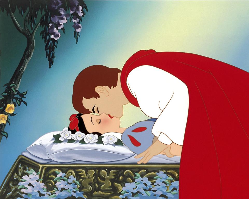 Illustration of Prince Charming kissing Snow White.