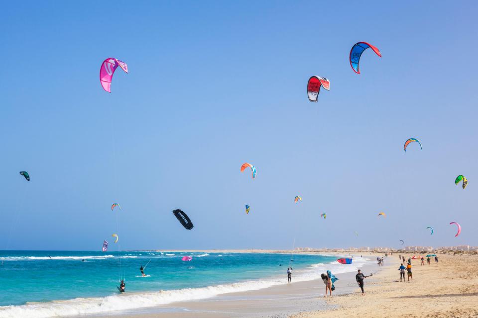 Kite surfers at Praia da Fragata beach in Cape Verde.