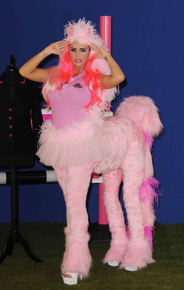 Katie Price in a pink pony costume at a photocall.