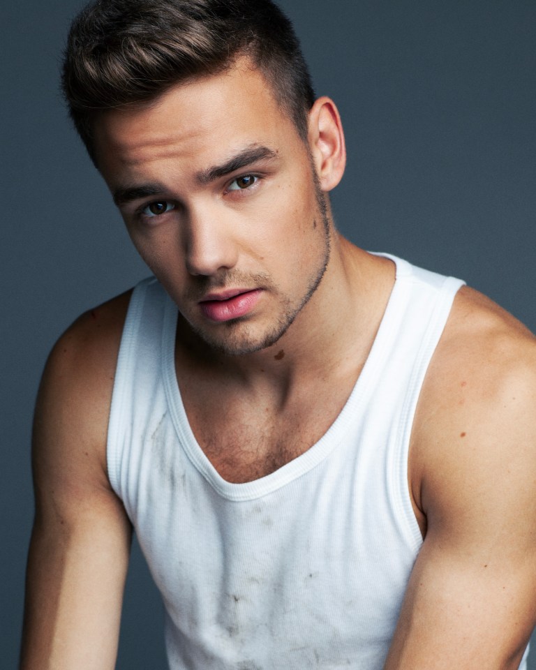 Liam Payne portrait, wearing a white tank top.