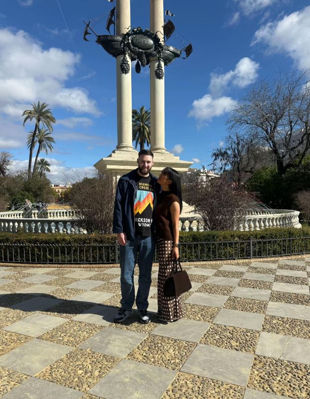 Sharon Gaffka and her boyfriend in front of a monument.