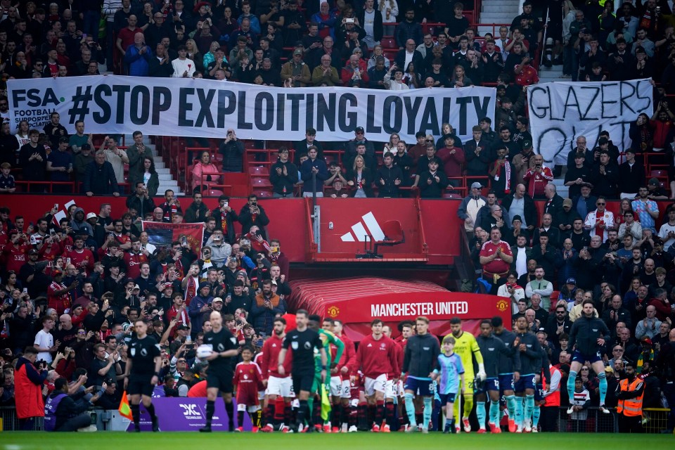 Manchester United fans protesting the Glazer family ownership.