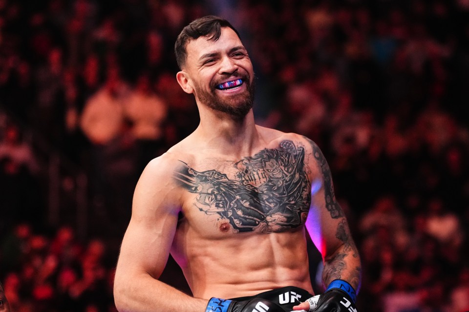 Mauricio Ruffy of Brazil smiles after winning a lightweight UFC fight.