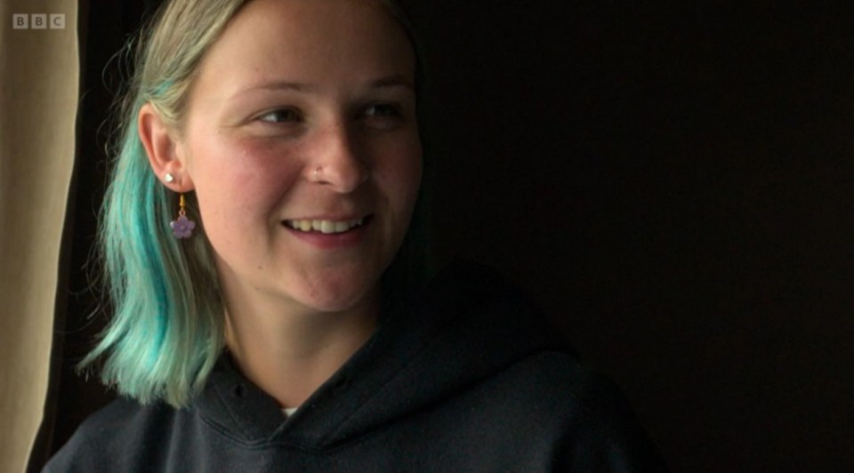 Photo of a young woman smiling.