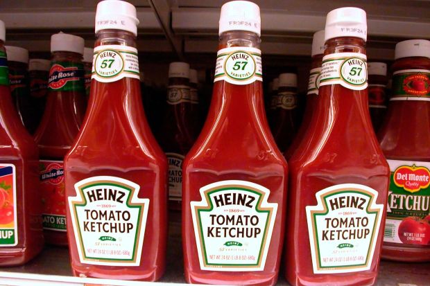 An image collage containing 1 images, Image 1 shows Bottles of Heinz tomato ketchup on a supermarket shelf