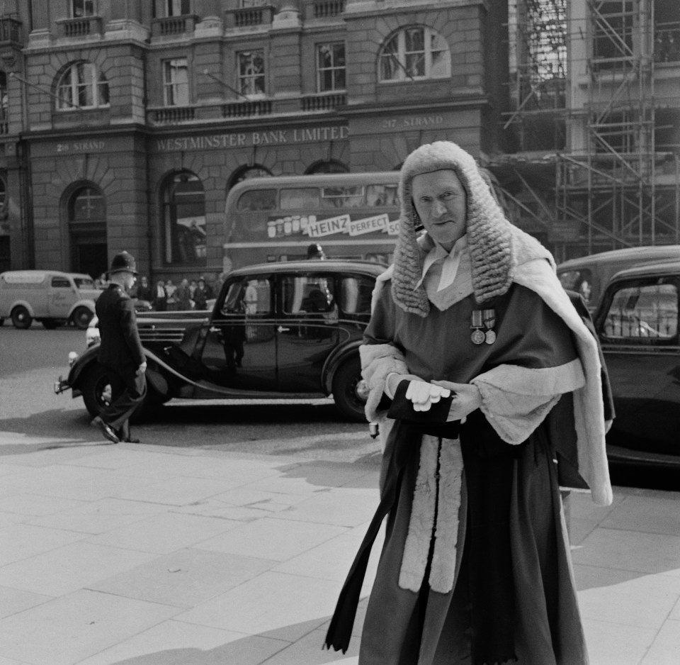 Black and white photo of Judge Cecil Havers outside the Royal Courts of Justice in London.