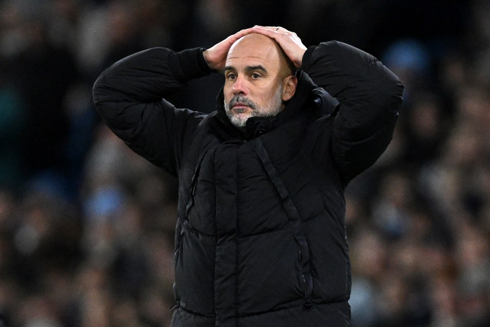 Pep Guardiola, Manchester City manager, looking dejected.
