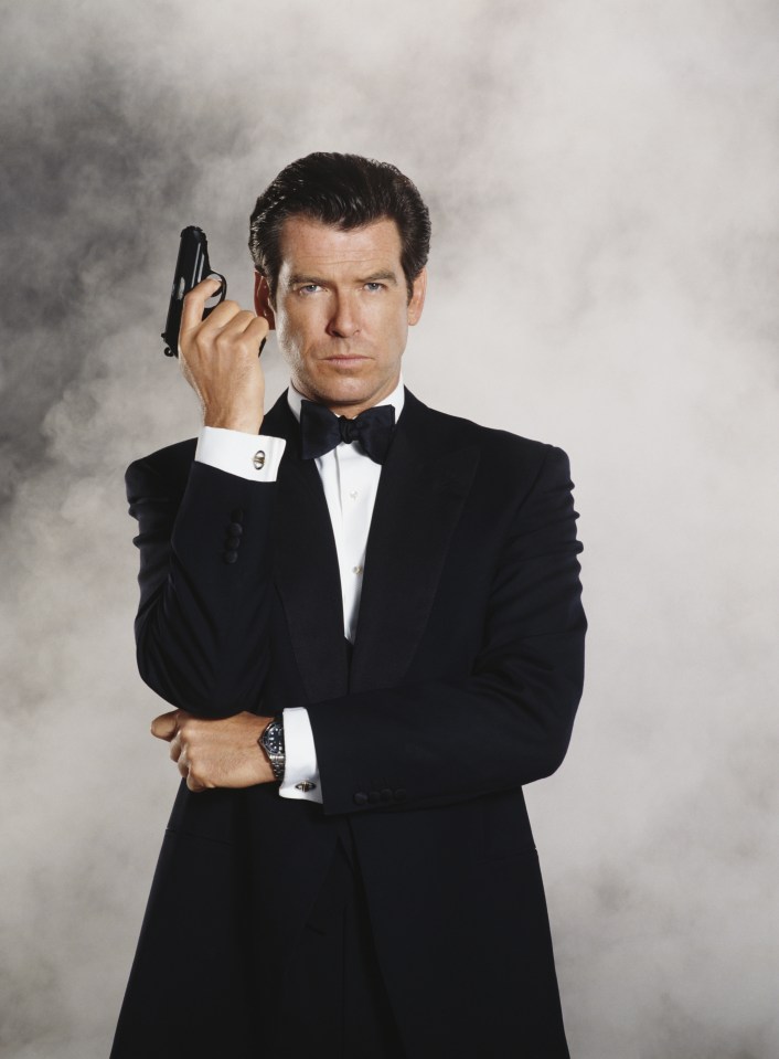 Pierce Brosnan as James Bond holding a gun.