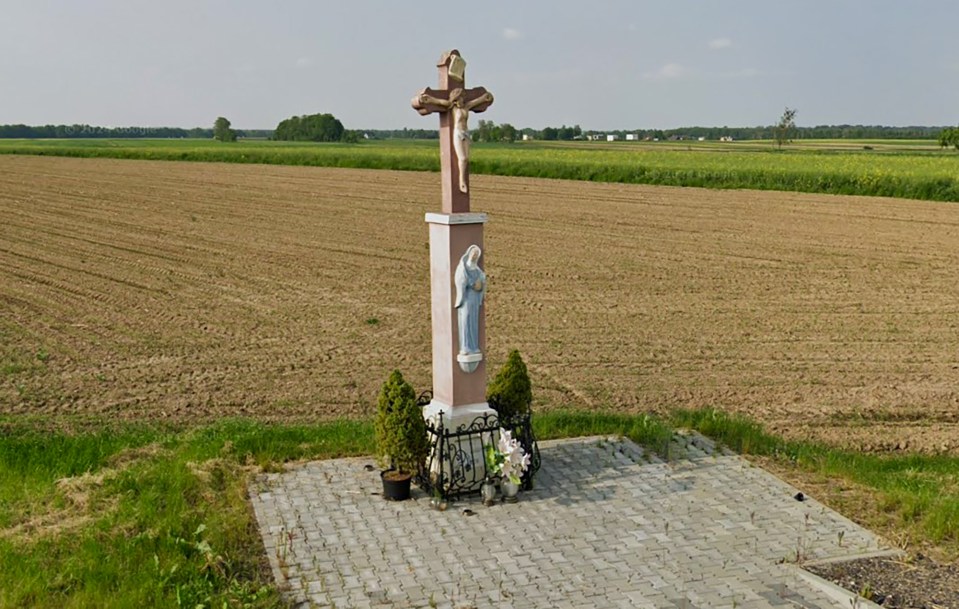 Religious shrine in a field.