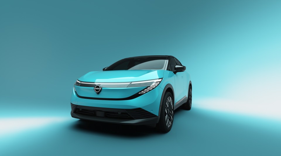 A light blue Nissan Leaf.