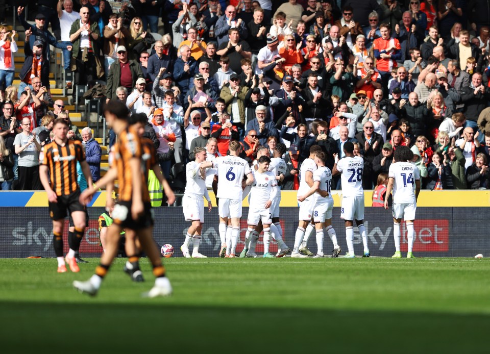 Luton Town players celebrating a goal.