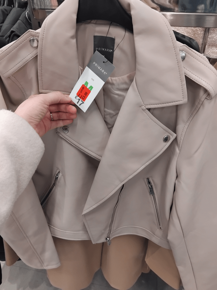 A light beige Primark leather jacket with a price tag showing a reduced price of £3.