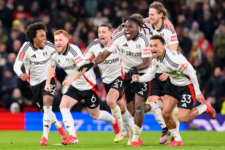 Fulham players celebrating a victory.