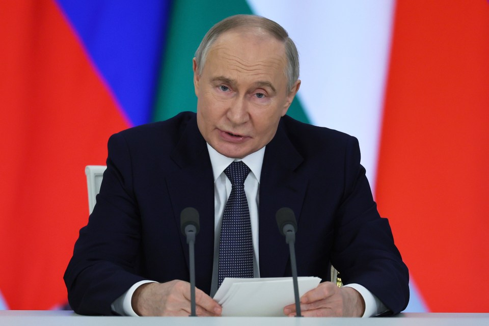 Vladimir Putin speaking at a press conference.