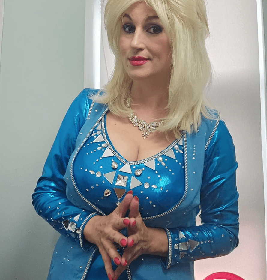 Woman in a sparkly blue outfit.