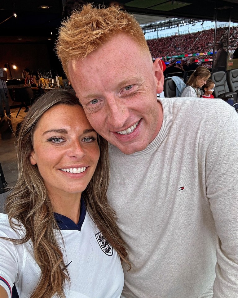 Selfie of a couple at a soccer game.