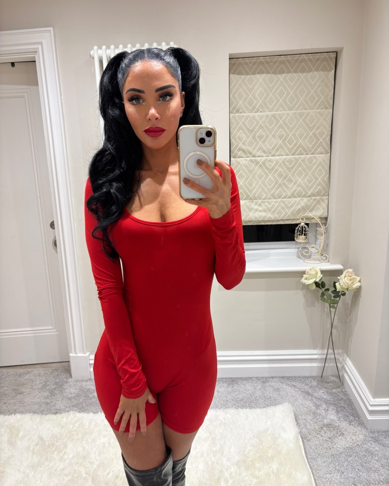 Tulisa Contostavlos in a red jumpsuit.