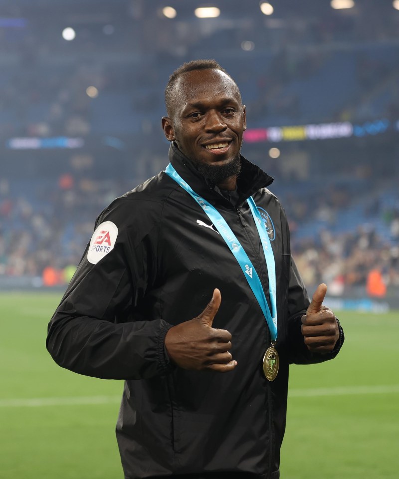Usain Bolt at Soccer Aid for UNICEF, giving a thumbs-up.