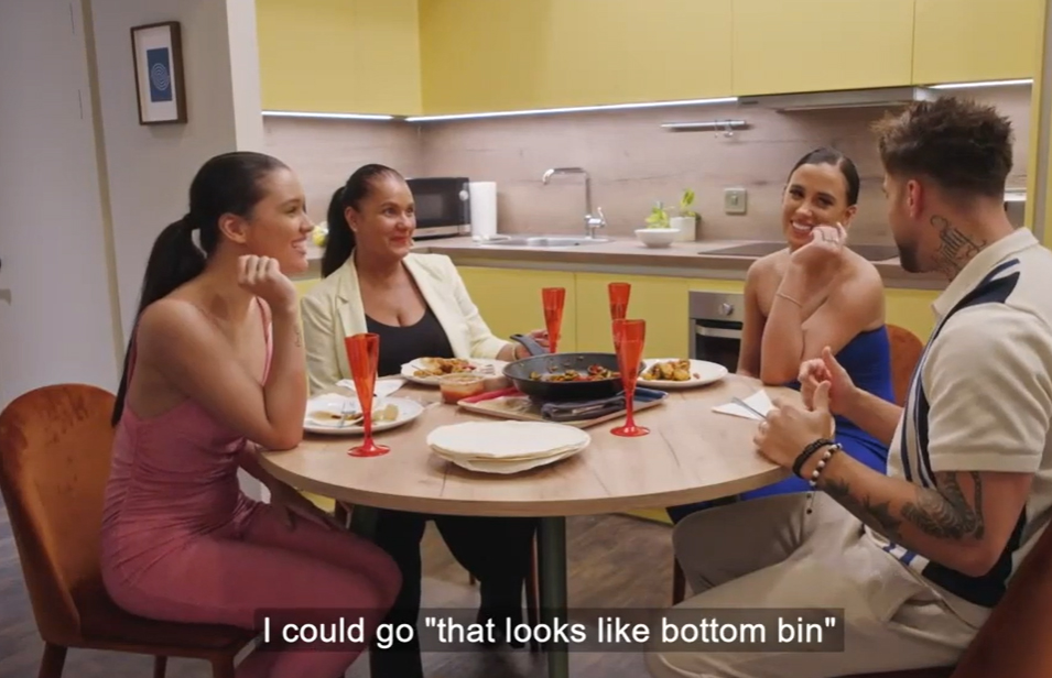 Screenshot of a scene from MAFS UK showing four people sitting around a table, reacting to food.