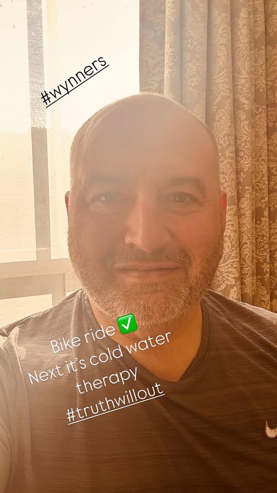 Man's selfie with text overlay: "Bike ride ✅ Next it's cold water therapy #truthwillout #wynners"