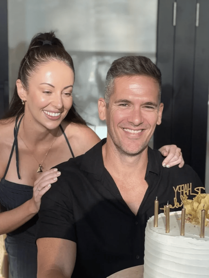 Jono and Ellie celebrating with a birthday cake.