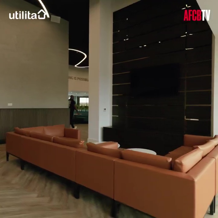 Interior view of AFC Bournemouth's training center lounge.