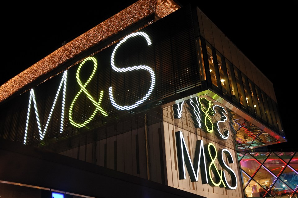 London, England - December 3, 2011: Marks &amp;amp;amp; Spencer shop at Westfield shopping center. Westfield is an indoor and outdoor shopping center. This Marks &amp;amp;amp; Spencer shop has entrance from outdoor promenade of the Westfield shopping center. M&amp;amp;amp;S is a british retail company selling most goods from donuts to jeans. They own over 700 stores in UK and over 300 stories in various other countries.