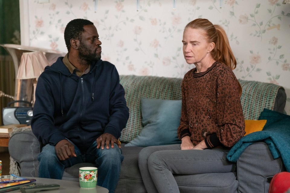 Kojo and Bianca sitting on a couch, in conversation.