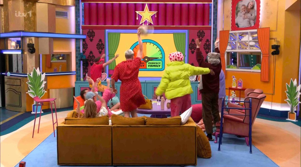 Housemates celebrating after completing a family task.