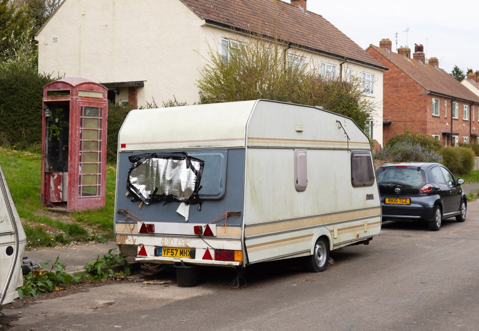 Caravan parked on a residential street.
