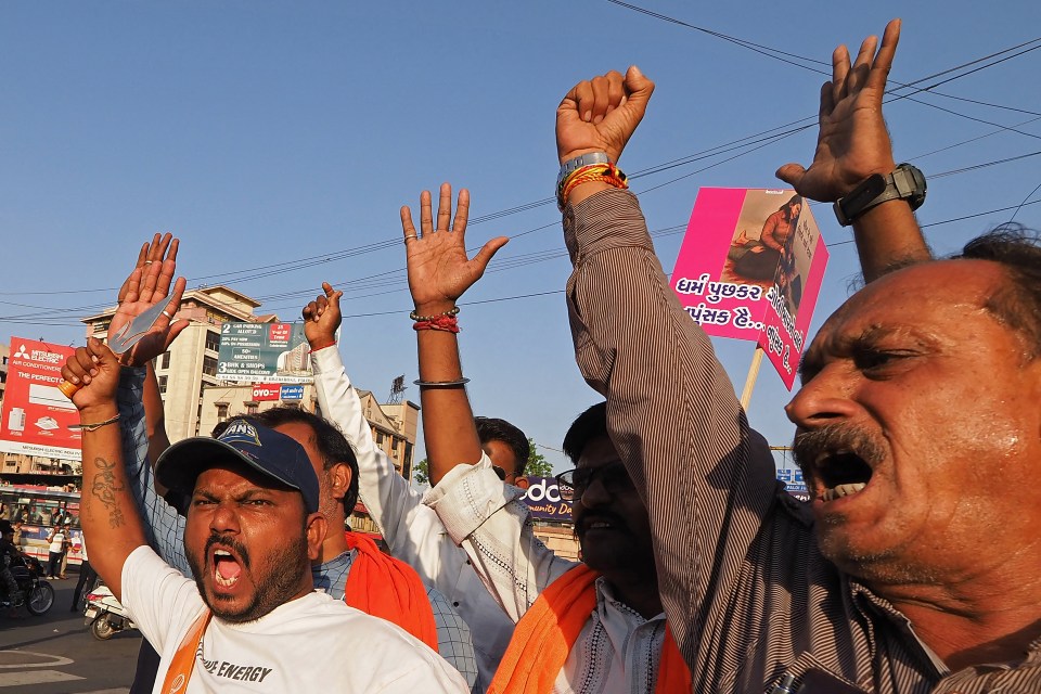 Protestors in Ahmedabad condemn the killing of tourists in Kashmir.