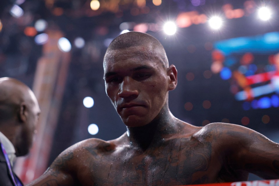 Conor Benn looking dejected after a boxing match.